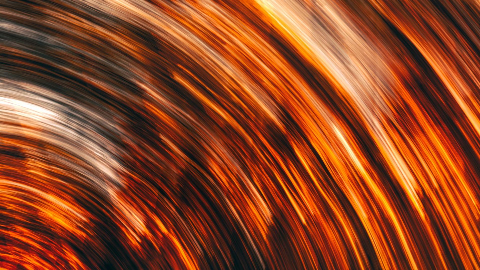Abstract background with dynamic light lines suggesting movement and energy.